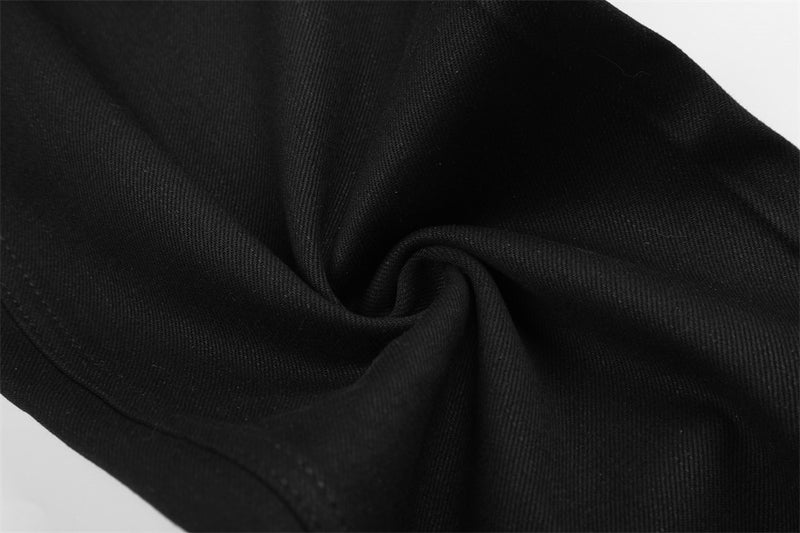 Pantalon à jambes larges avec poches contrastantes à pois et revers aux ourlets