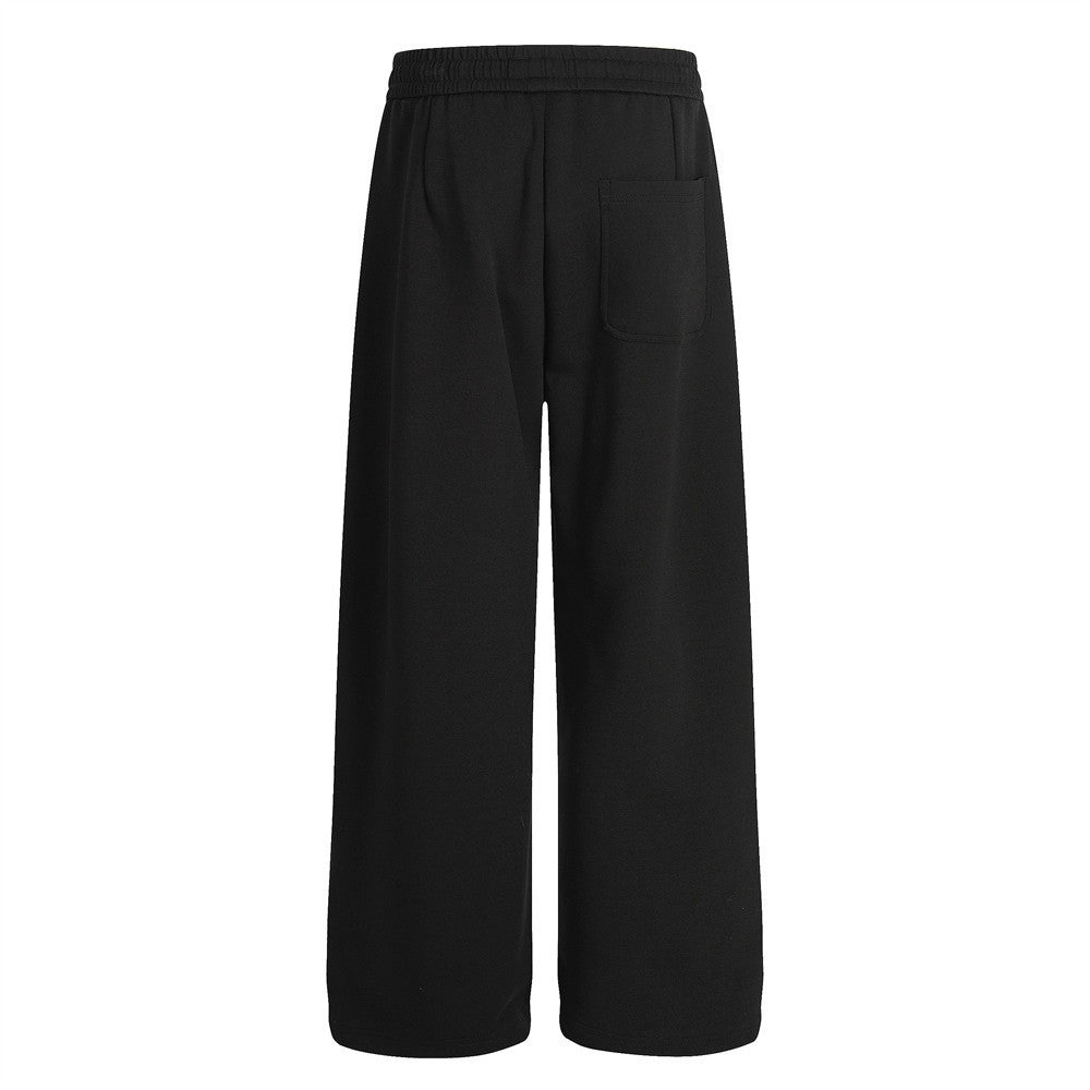 Pantalon de survêtement homme à jambes larges – Coupe ample, taille élastique, coloris uni