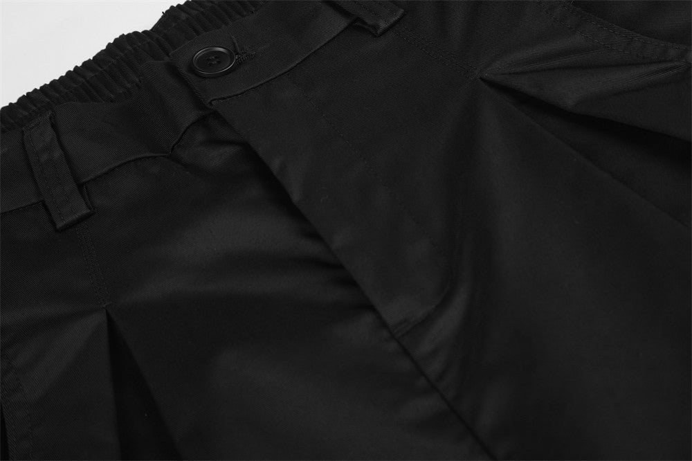 Wide-Leg Pleated Trousers – Oversized Silhouette with Curved Hem