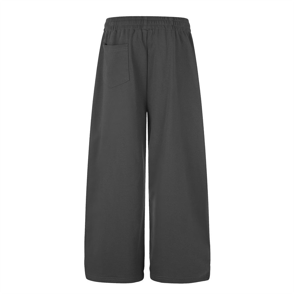 Jogging homme coupe large avec détails de boutons croisés et taille élastique