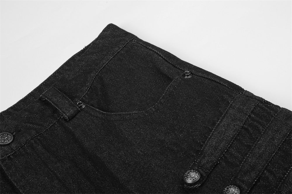 Close-up of black denim upper front with pocket curve and waistband button details
