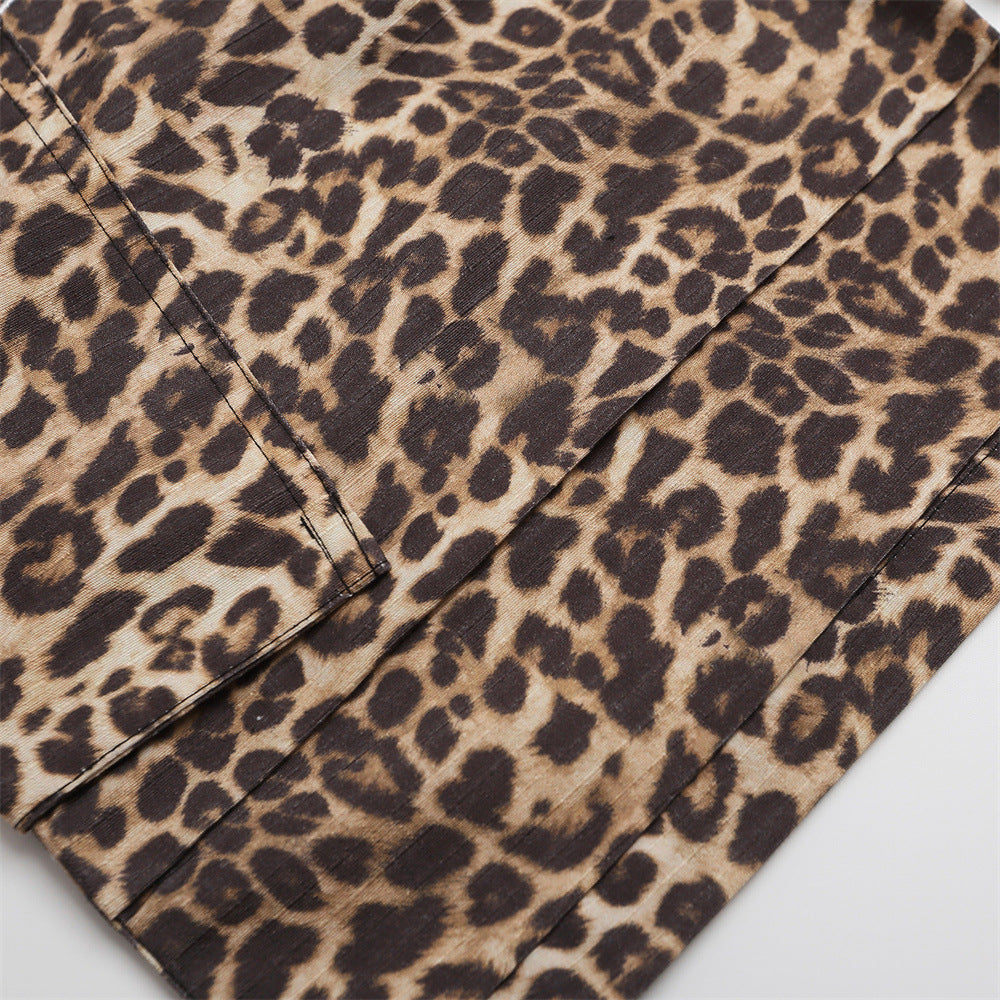 Close-up of leopard print shorts leg panel with visible seam stitching and textured fabric