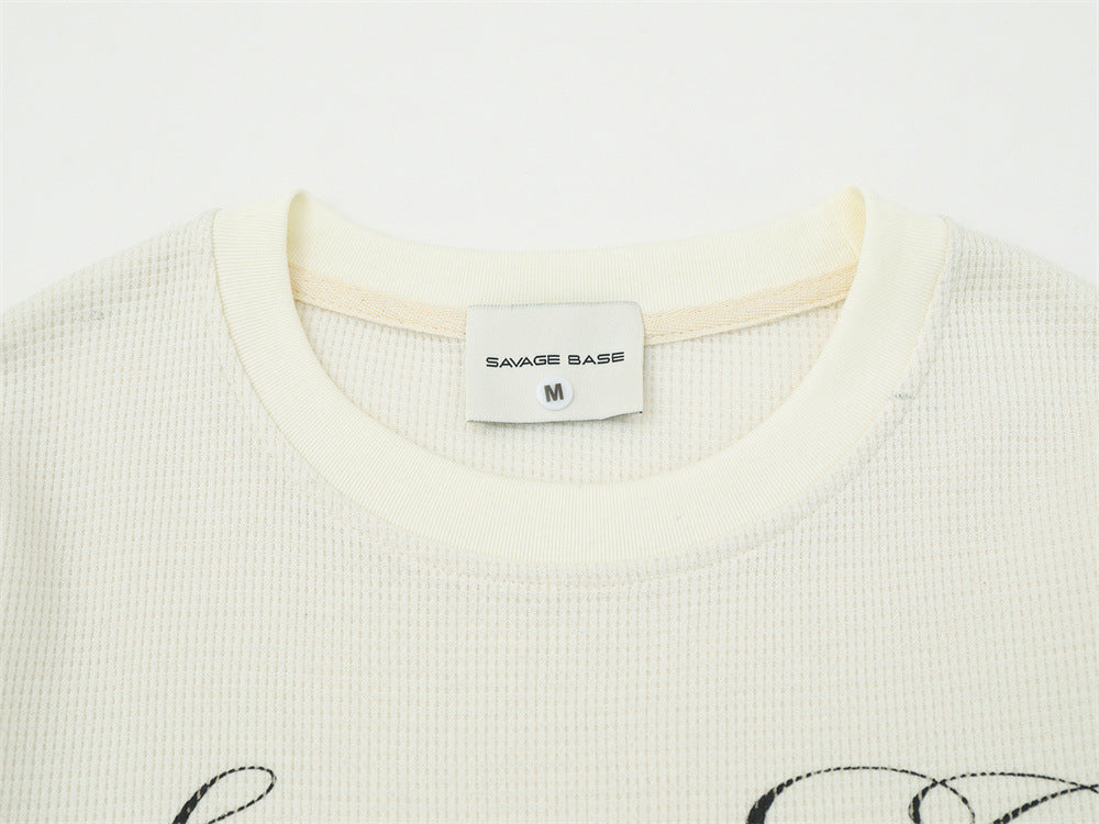 Langarmshirt aus Waffelstrick – Distressed-Print im American-Vintage-Stil, Relaxed Fit