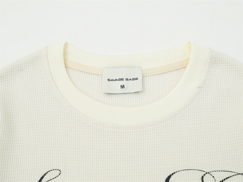 Langarmshirt aus Waffelstrick – Distressed-Print im American-Vintage-Stil, Relaxed Fit