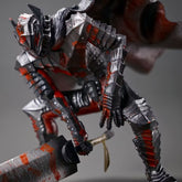 The Berserk Guts Bloodstained Warrior Statue is a 1/7 scale PVC figure, 18 cm tall, featuring an armored, berserk figure with a massive sword and cloak. Its dark metallic hues and red accents emphasize the sharp angular design, mimicking battle-worn bloodstains for a formidable presence.