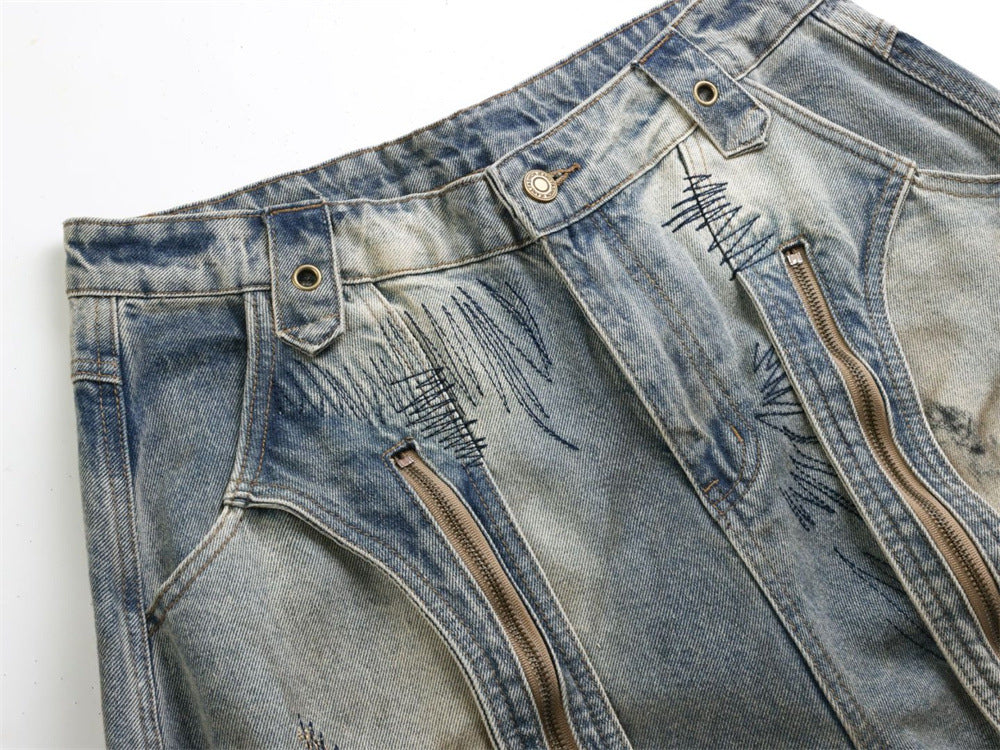 Baggy Wide-Leg Jeans – Chaotic Embroidery, Distressed Denim & Arc-Hem Design