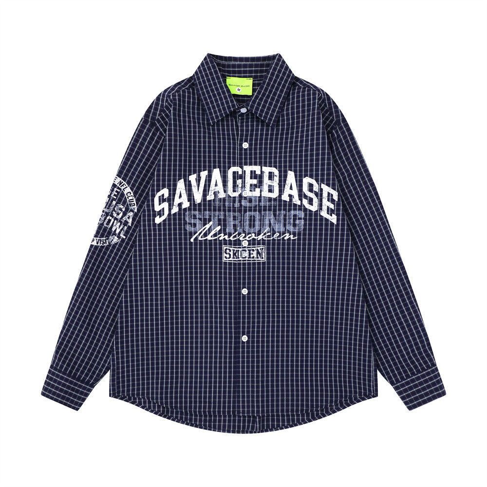 Oversized plaid long sleeve shirt with SAVAGEBASE varsity graphic print on chest and sleeve in brown and navy colorways