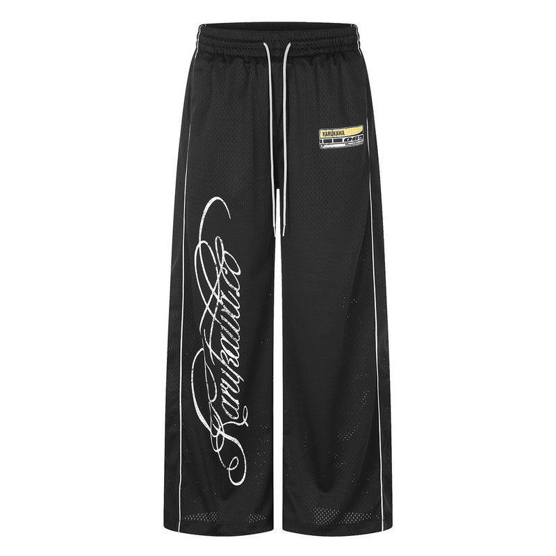 Karukawa Herren-Hose mit weitem Bein aus schwarzem Mesh, kursivem Logo-Print und weißem Paspelband an den Seiten
