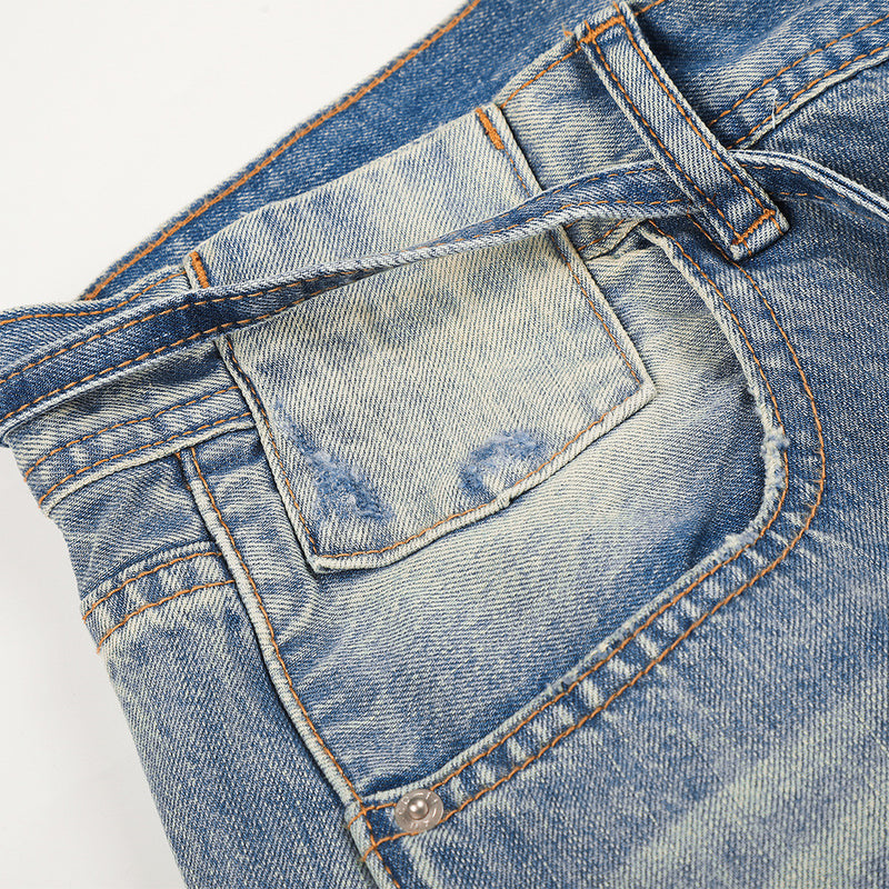 Wide-Leg Distressed Jeans – Gradient Washed Denim with Ripped Details
