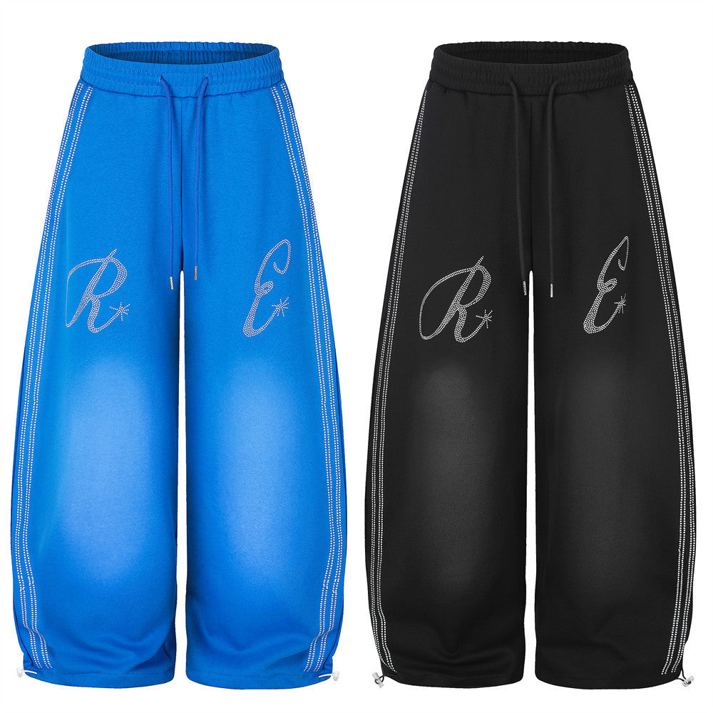 Jogginghose mit weitem Bein und Strass-Schriftzug – Oversize-Streetwear-Jogger für