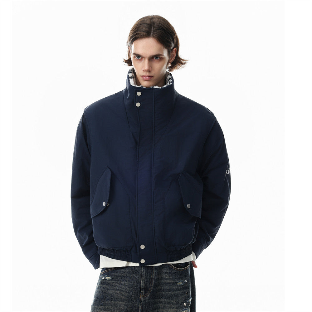 Men's reversible dalmatian faux fur and solid nylon stand-collar oversized bomber jacket in white and black spot print