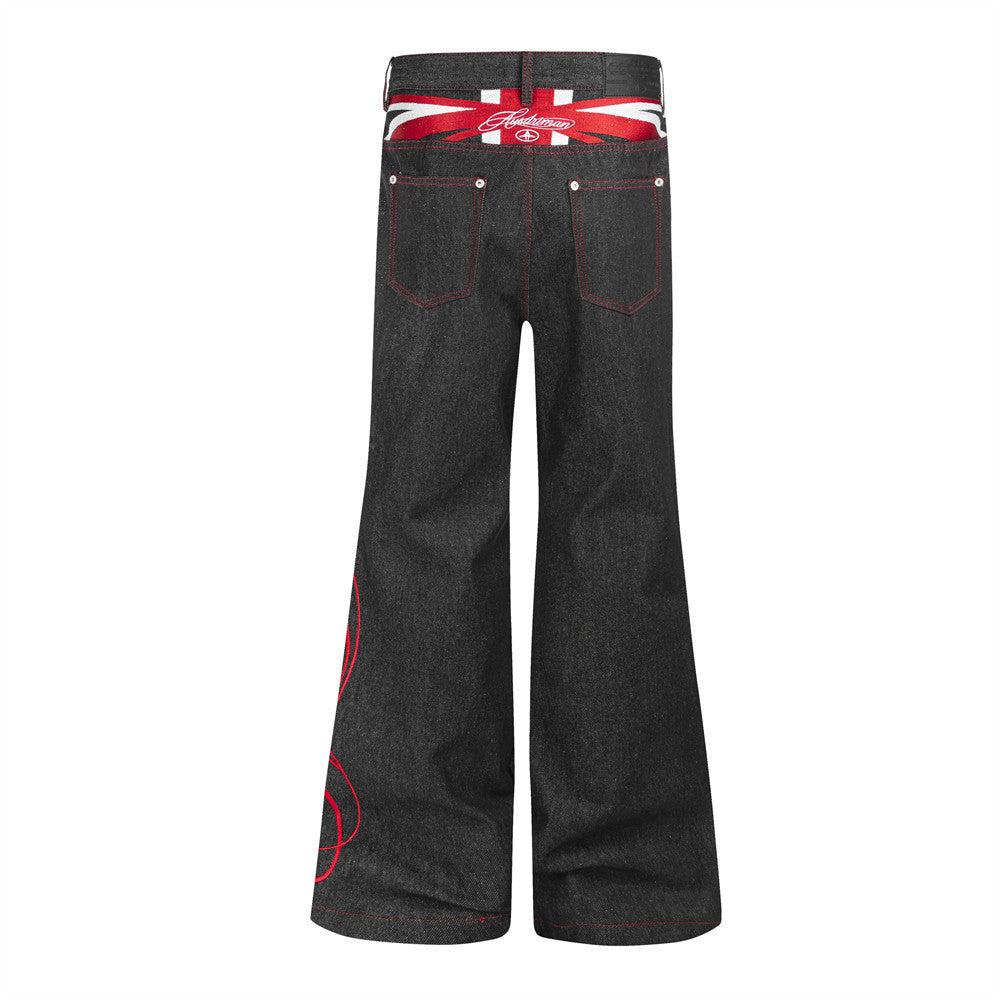 Herren-Flare-Jeans in Schwarz mit roter Script-Stickerei – Wide Leg aus Raw Denim