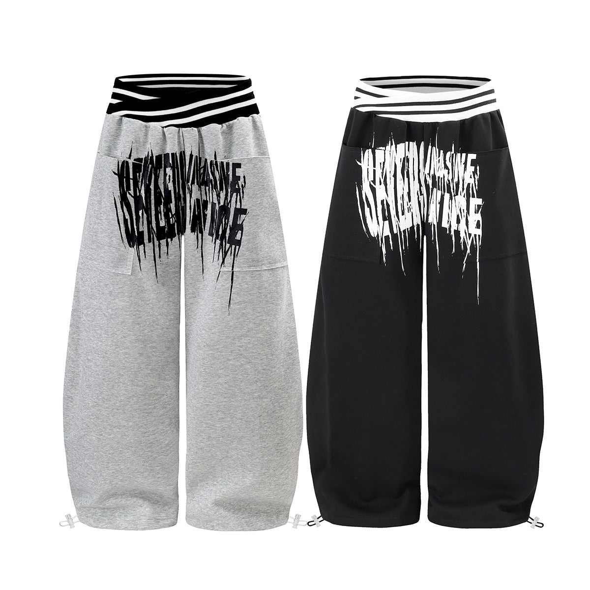 Jogginghose mit weitem Bein zum Hineinschlüpfen, gestreiftem Bund und Gothic-Grafikprint
