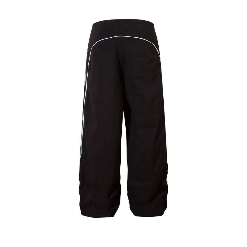 Herren-Trackpants mit kontrastierender Paspel und Colorblock-Seiteneinsätzen