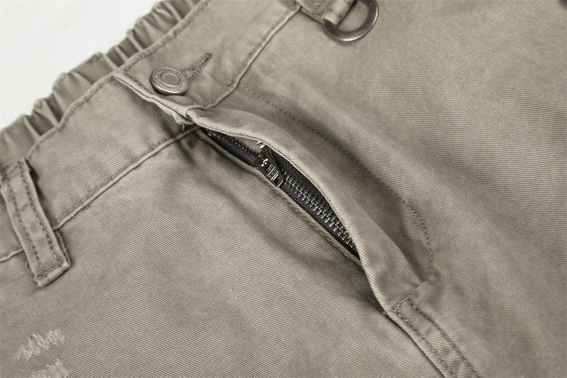 Pantalon cargo wide leg – Kaki délavé, éclaboussures de peinture et chaîne métallique
