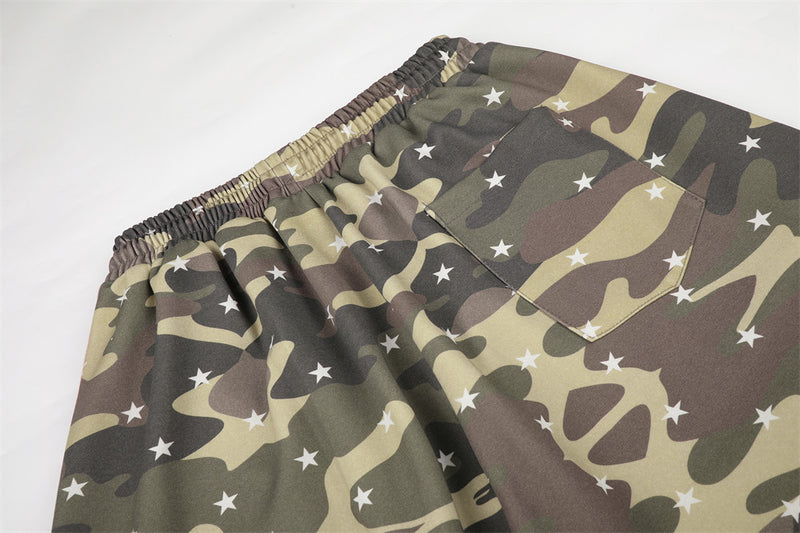 Back waist detail of camo pants with elastic waistband and patch pocket