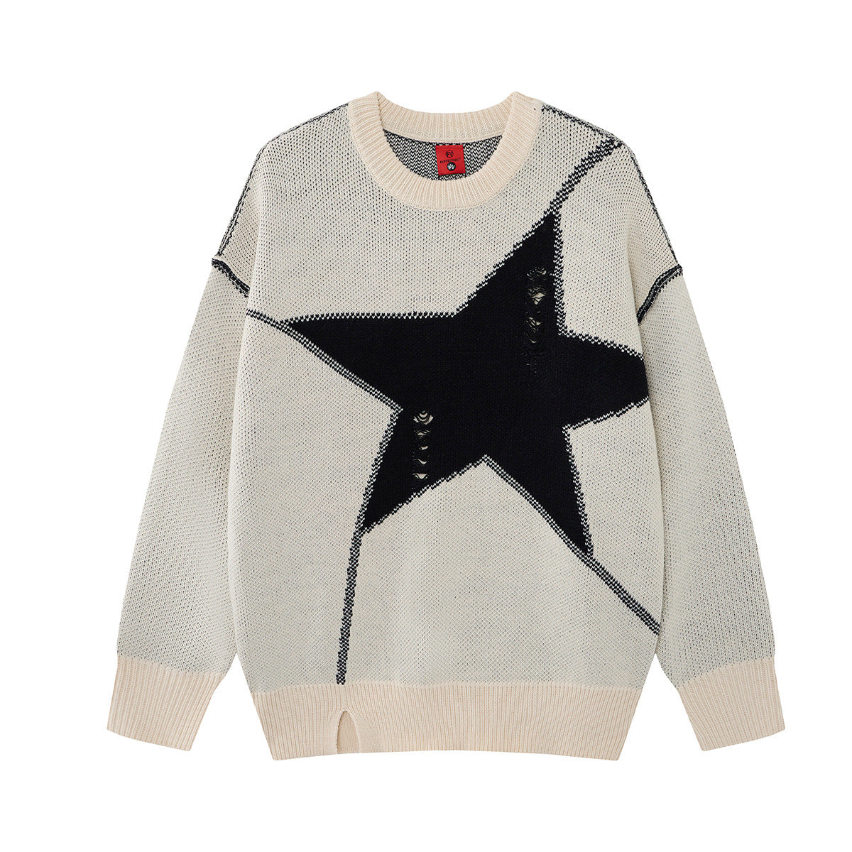 Pull oversize crème à col rond, grand motif jacquard étoile noire et détails de maille délavée sur le devant