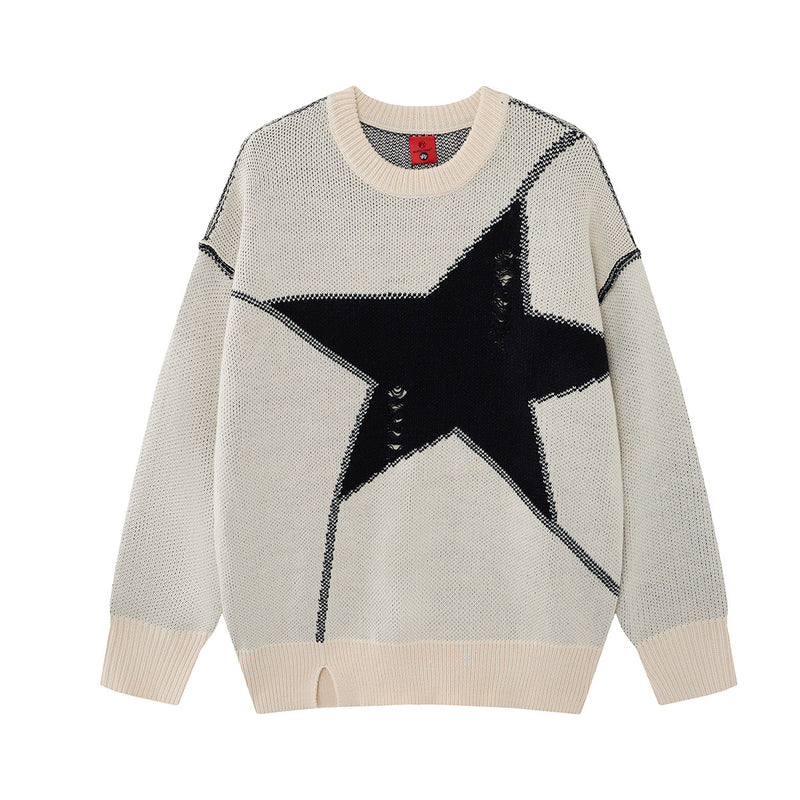 Pull oversize crème à col rond, grand motif jacquard étoile noire et détails de maille délavée sur le devant