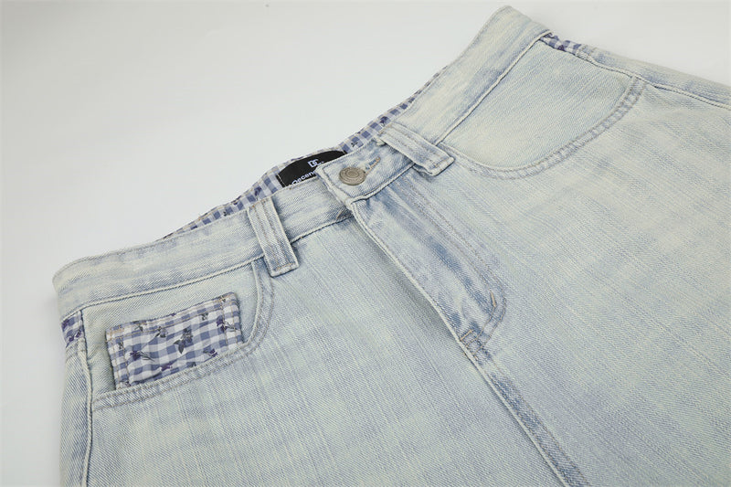 Jean homme à jambes larges, délavage clair, denim vintage déstructuré et empiècements vichy