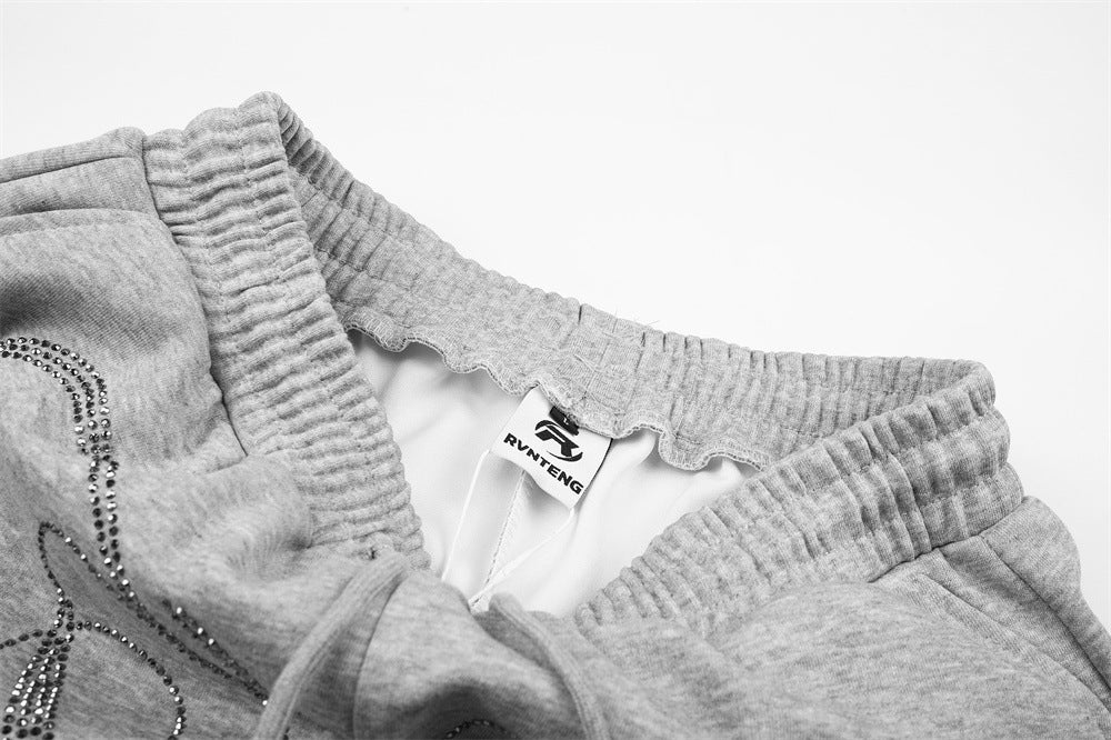 Pantalones de Chándal de Pierna Ancha con Texto de Strass – Corte Bombacho Extragrande con Cordón