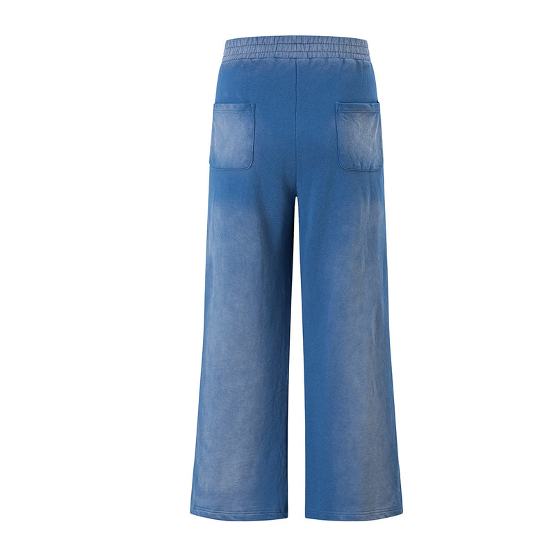 Pantalon de survêtement à jambes larges, imprimé graphique vintage effet acid-wash, coupe décontractée