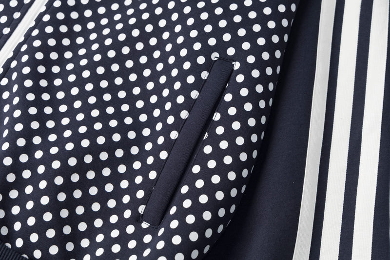 Veste de survêtement zippée à col montant, pois et manches à bandes