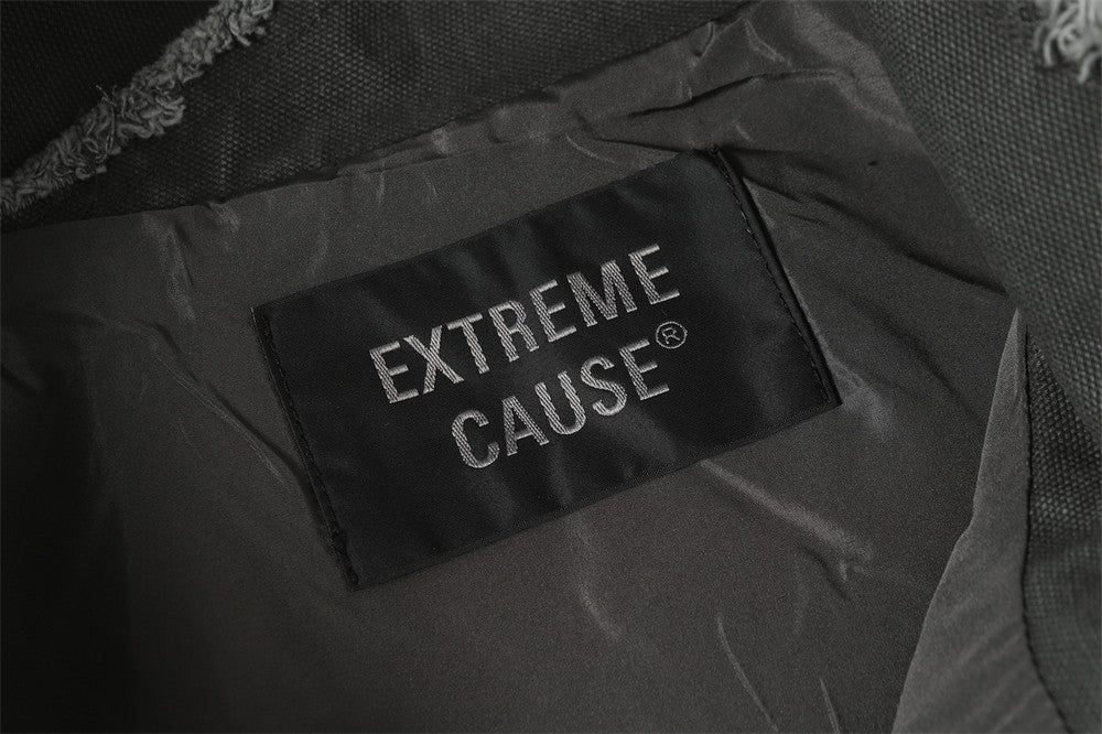 Blouson bomber déconstruit en toile à coutures effilochées et zip diagonal