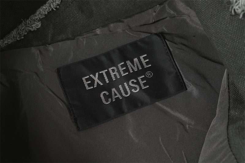 Blouson bomber déconstruit en toile à coutures effilochées et zip diagonal