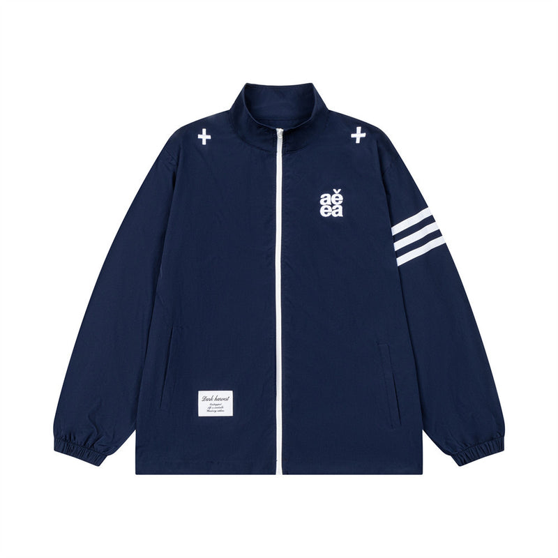 AEEA oversized stand collar track jacket in navy blue with three white stripe sleeves and logo embroidery