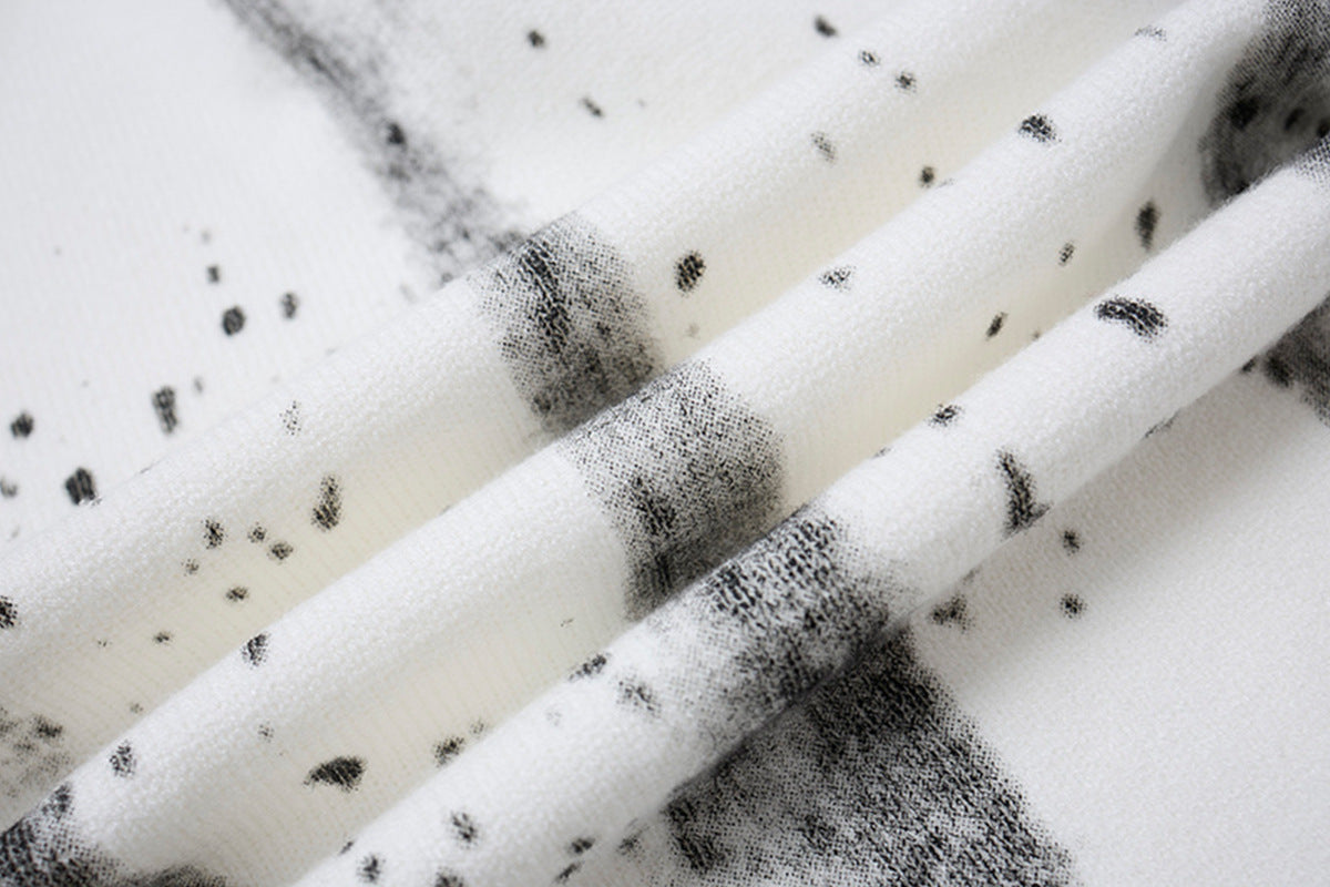 Pull en maille col rond éclaboussures d’encre – Motif peinture déstructuré