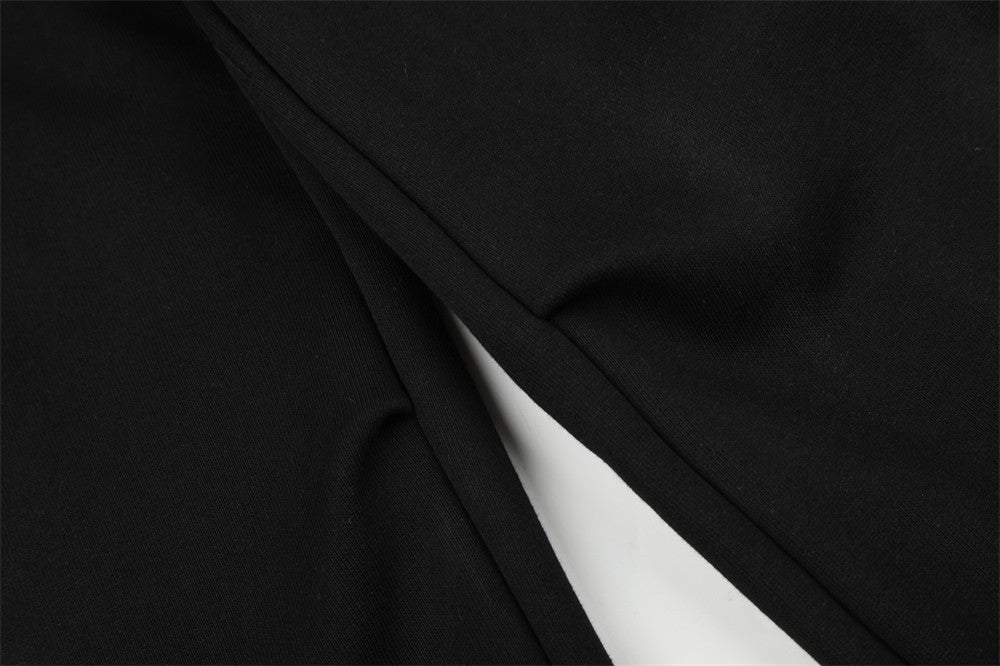 Pantalones de chándal holgados de pernera ancha con lavado efecto spray y gráfico de letras