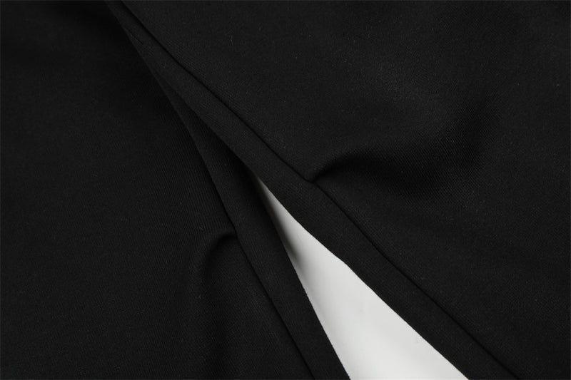 Pantalones de chándal holgados de pernera ancha con lavado efecto spray y gráfico de letras