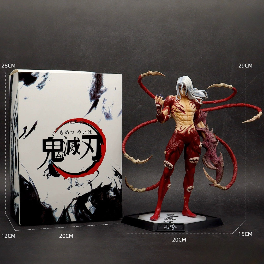 The Kokushibo Demon Slayer Figure is a 29CM PVC action figure from Kimetsu no Yaiba, featuring multiple tentacle-like arms and long white hair, standing dynamically on a base next to a Japanese-labeled box. Box dimensions: 28cm x 20cm x 12cm. Figurine dimensions: 29cm x 20cm x 15cm.