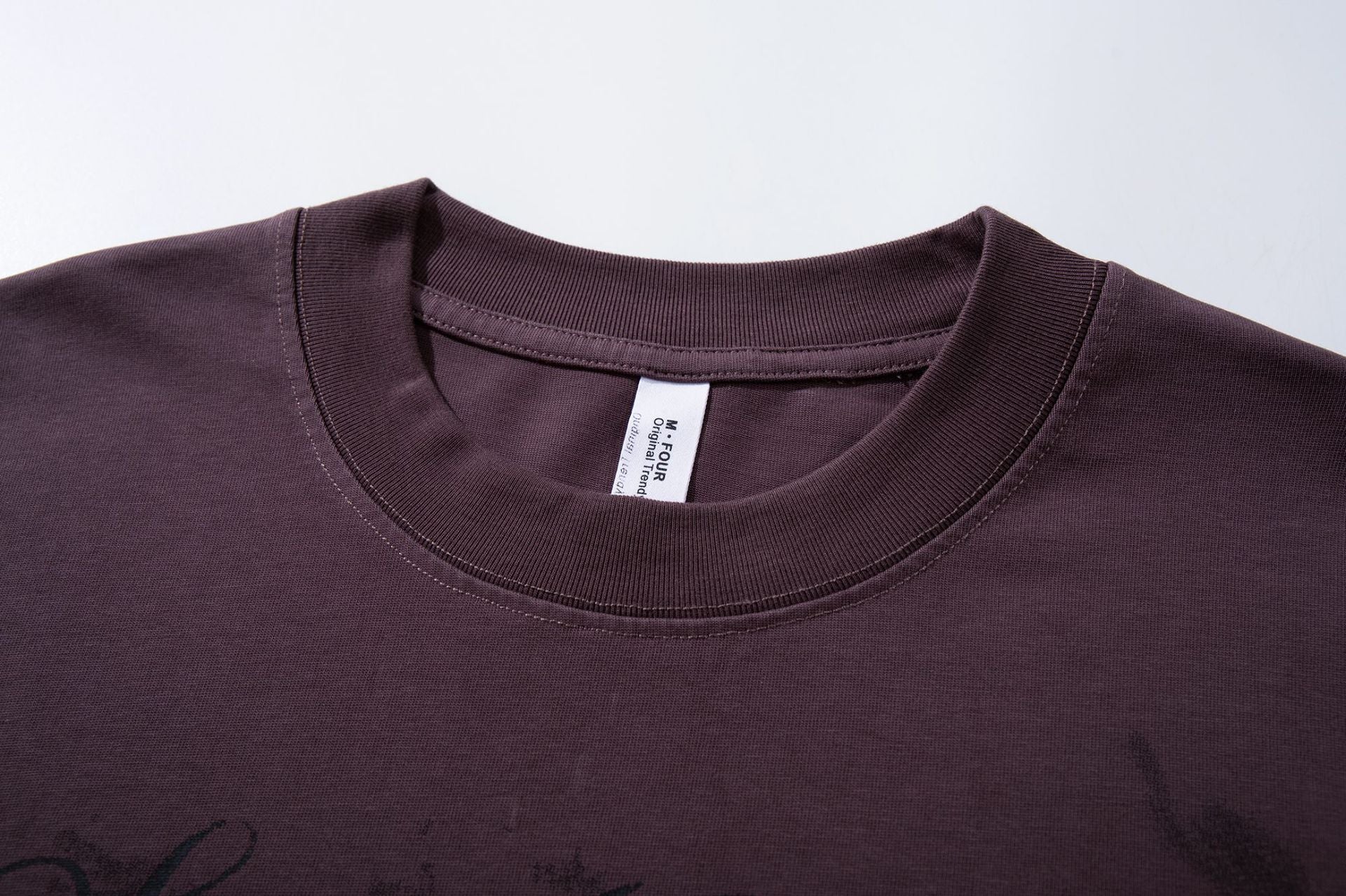 T-shirt graphique à manches longues – Ailes et inscription effet délavé, coupe oversize