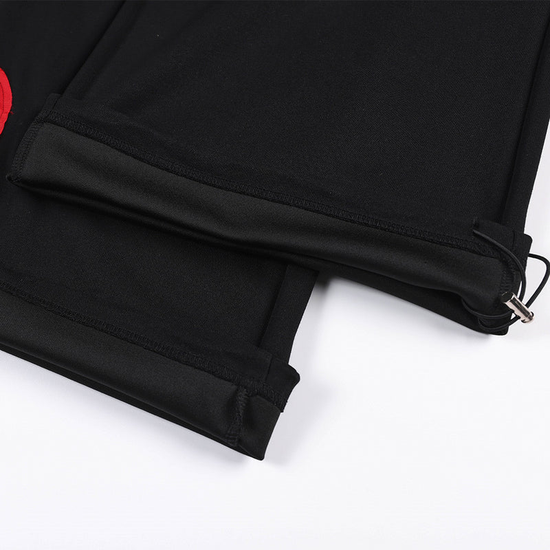 Wide-Leg Sweatpants with Camo & Script Patchwork Appliqués