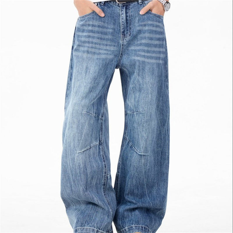 Wide-Leg Baggy Jeans – Washed Blue Curved Seam Design with Contrast Pocket