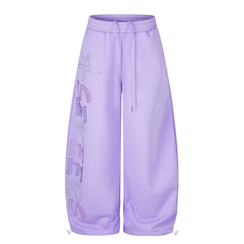 Oversized wide-leg sweatpants with rhinestone letter and starfish graphic in lavender purple and cobalt blue