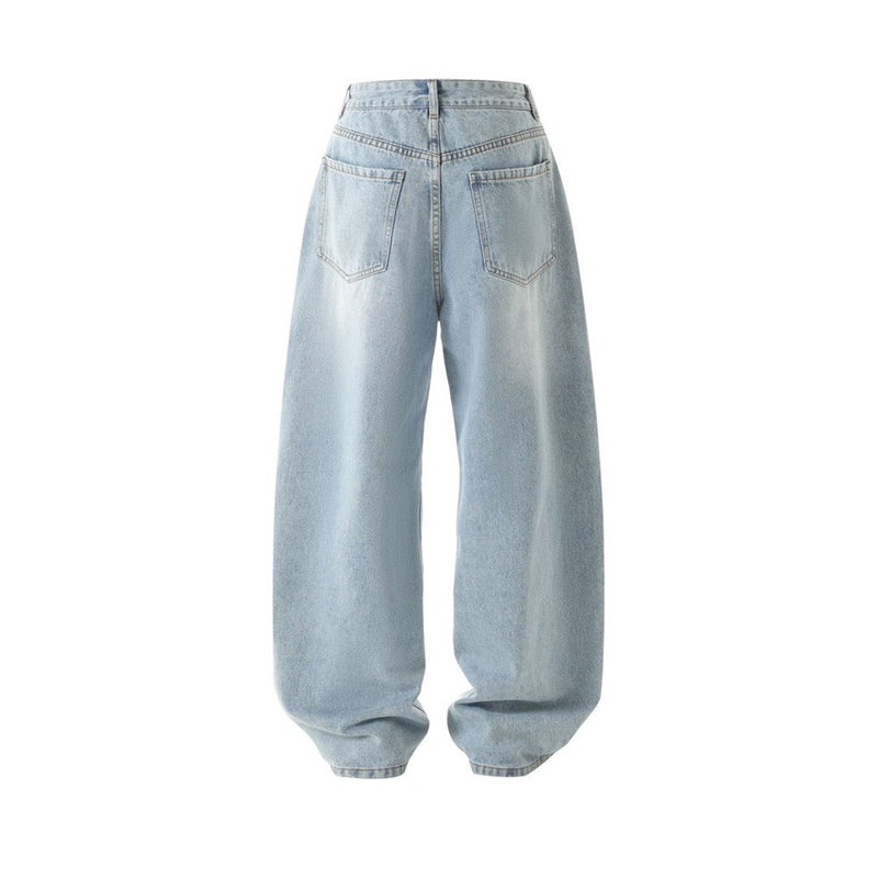 Light wash wide-leg jeans back view with patch pockets