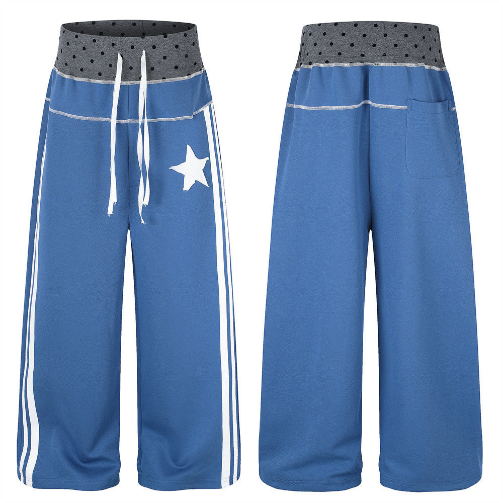 Pantalon de survêtement homme bleu à jambes larges, avec bandes latérales blanches, imprimé étoiles et ceinture repliée à cordon gris à pois