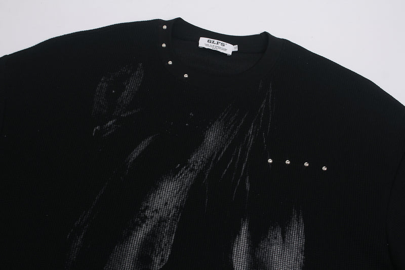 T-shirt graphique noir à manches longues avec détails cloutés et inscription