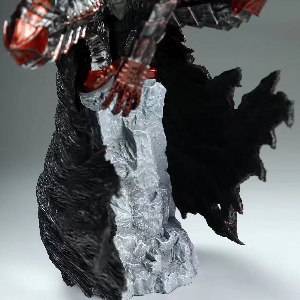 The Legend of the Golden Warrior – Berserk Guts L Version, a battle-damaged bloodstained PVC anime figure by Berserk, features dark tattered robes and metallic armor. The textured gray base and poised hands enhance the robe&