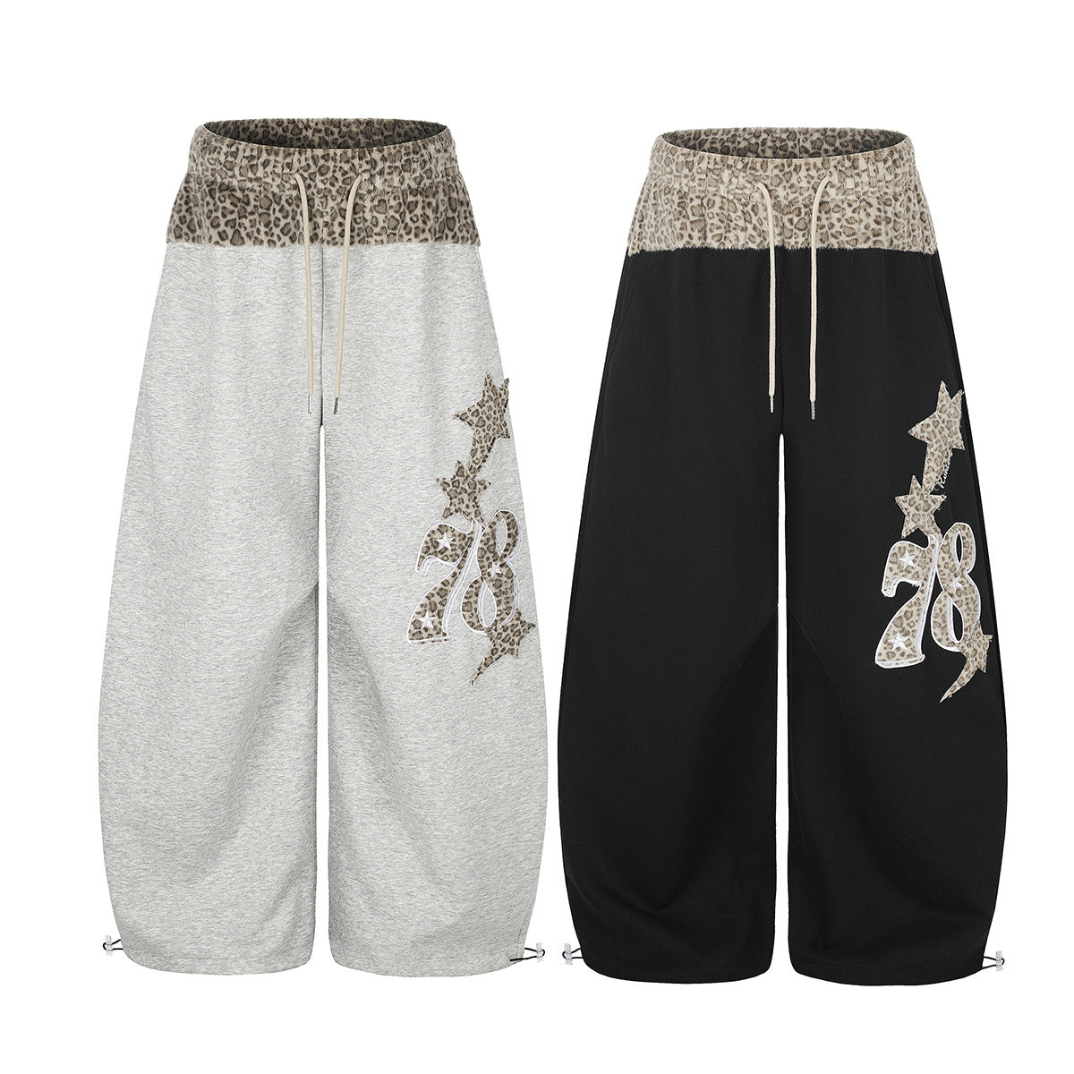 Wide-Leg-Sweatpants in meliertem Grau und Schwarz mit Leopardenmuster-Bund und Stern-Applikation am linken Bein