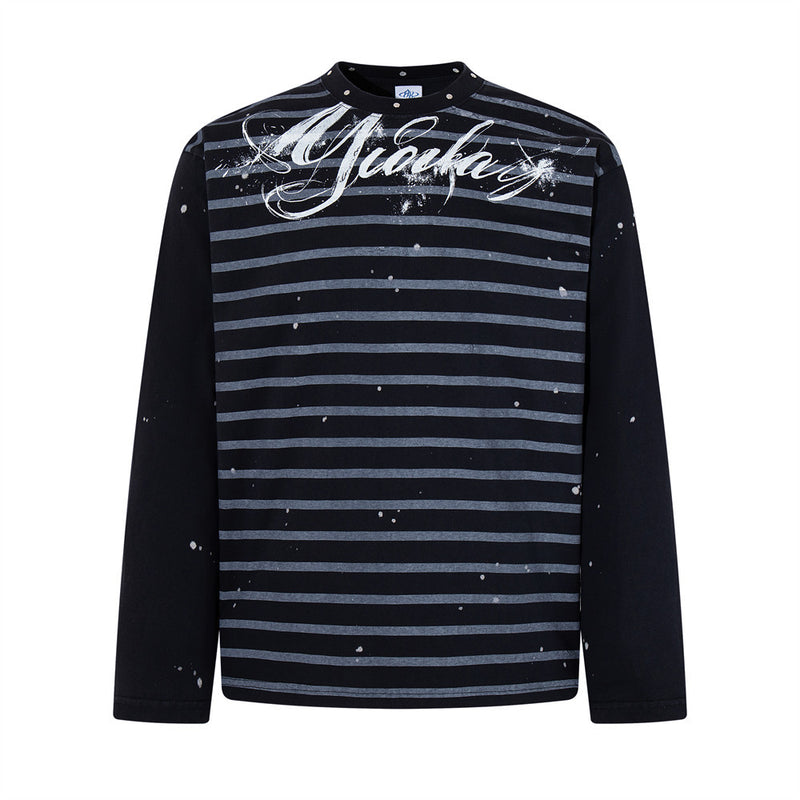 Oversized men's long-sleeve striped tee with paint-splatter detailing and script logo graphic in black colorway, front view