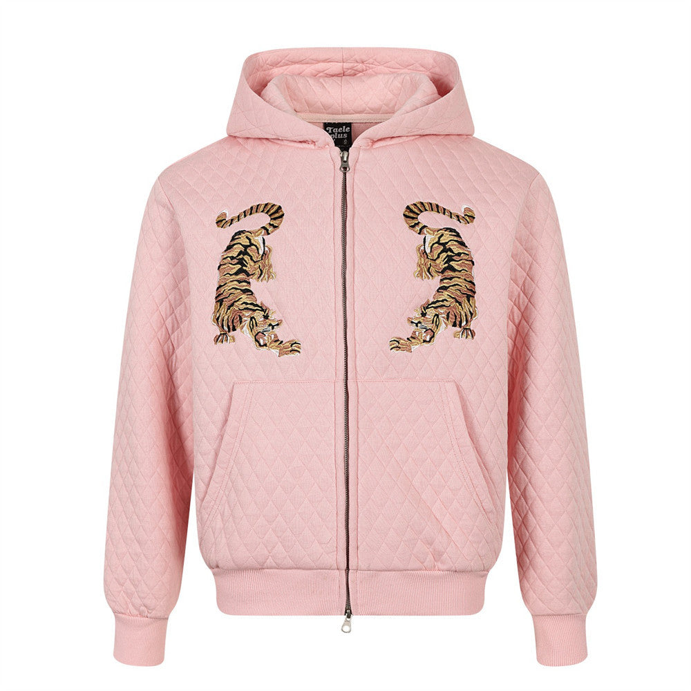Oversized quilted zip-up hoodie with tiger embroidery patches on chest, shown in pink with diamond quilted texture and full-l