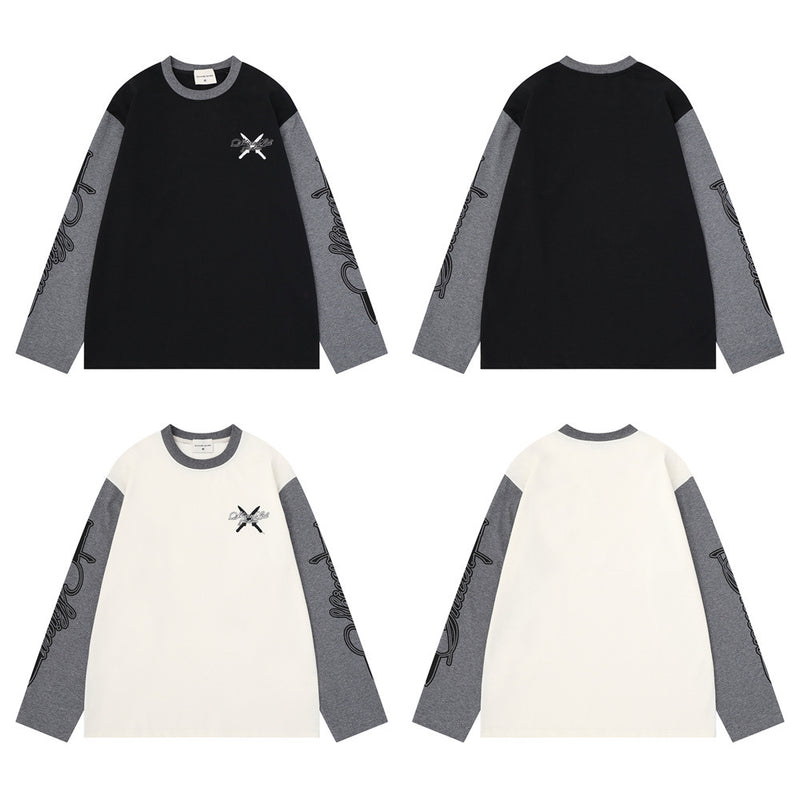 Camiseta de manga larga con bloques de color para hombre, con mangas gris jaspeado y bordado caligráfico, mostrada en tonos negros y crema