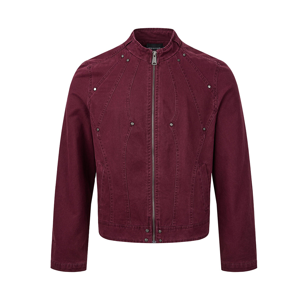 Washed denim moto jacket with studded rivet details and curved seam paneling in burgundy red