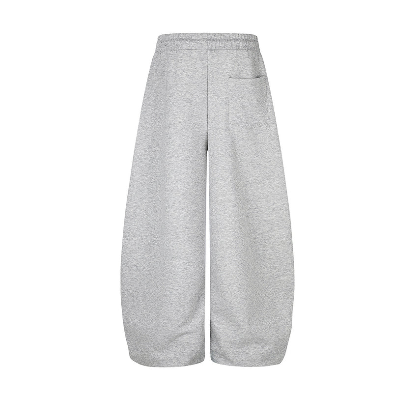 Pantalon de survêtement à jambes larges avec rayures rétro et imprimé graphique