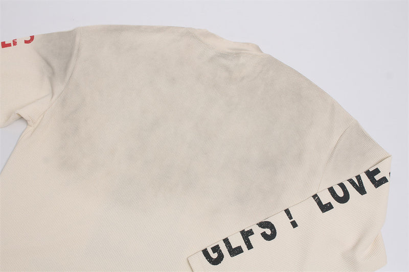 Herren-Langarmshirt aus Waffelstrick mit Grafik – „Loneliness Broken Reality“-Print