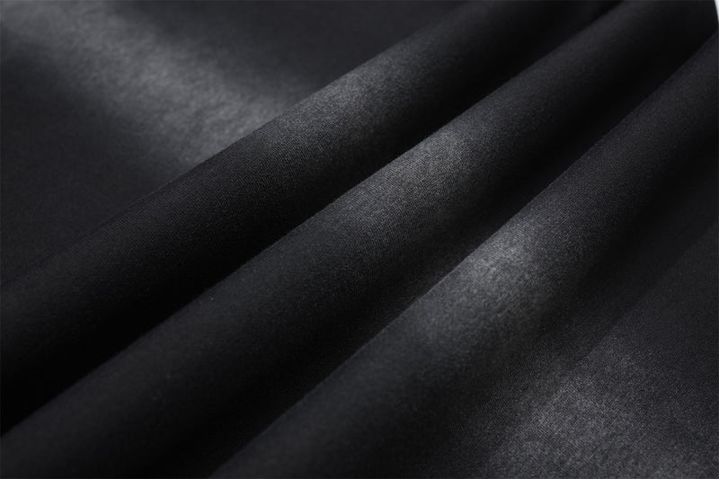 Pantalon de survêtement à jambes larges avec croix gothique et finition délavée