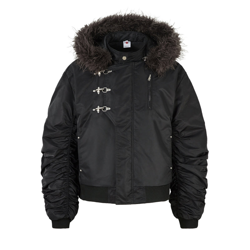 Black padded bomber jacket with detachable faux fur-trimmed hood, silver metal toggle closures, and ruched gathered sleeves